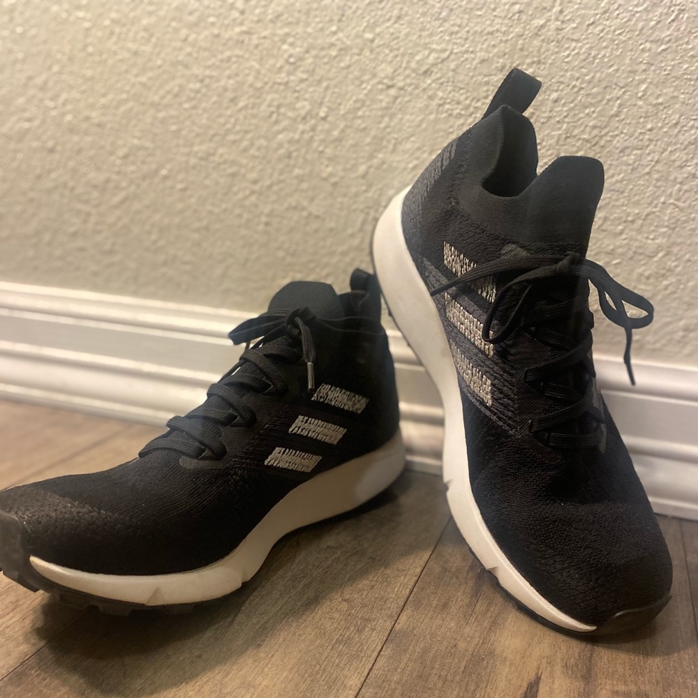 Men’s Adidas Ultra boost athletic shoes.